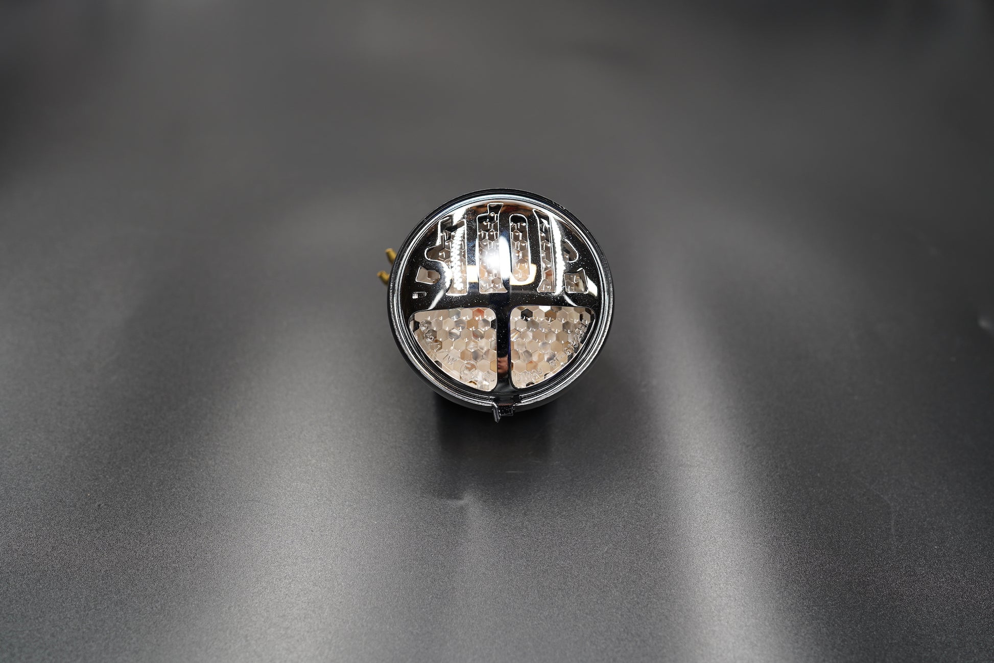 Rear view showing metal housing and wiring exit