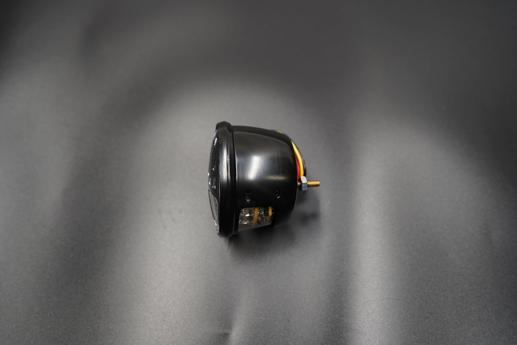 Depth shot showing solid metal housing thickness.