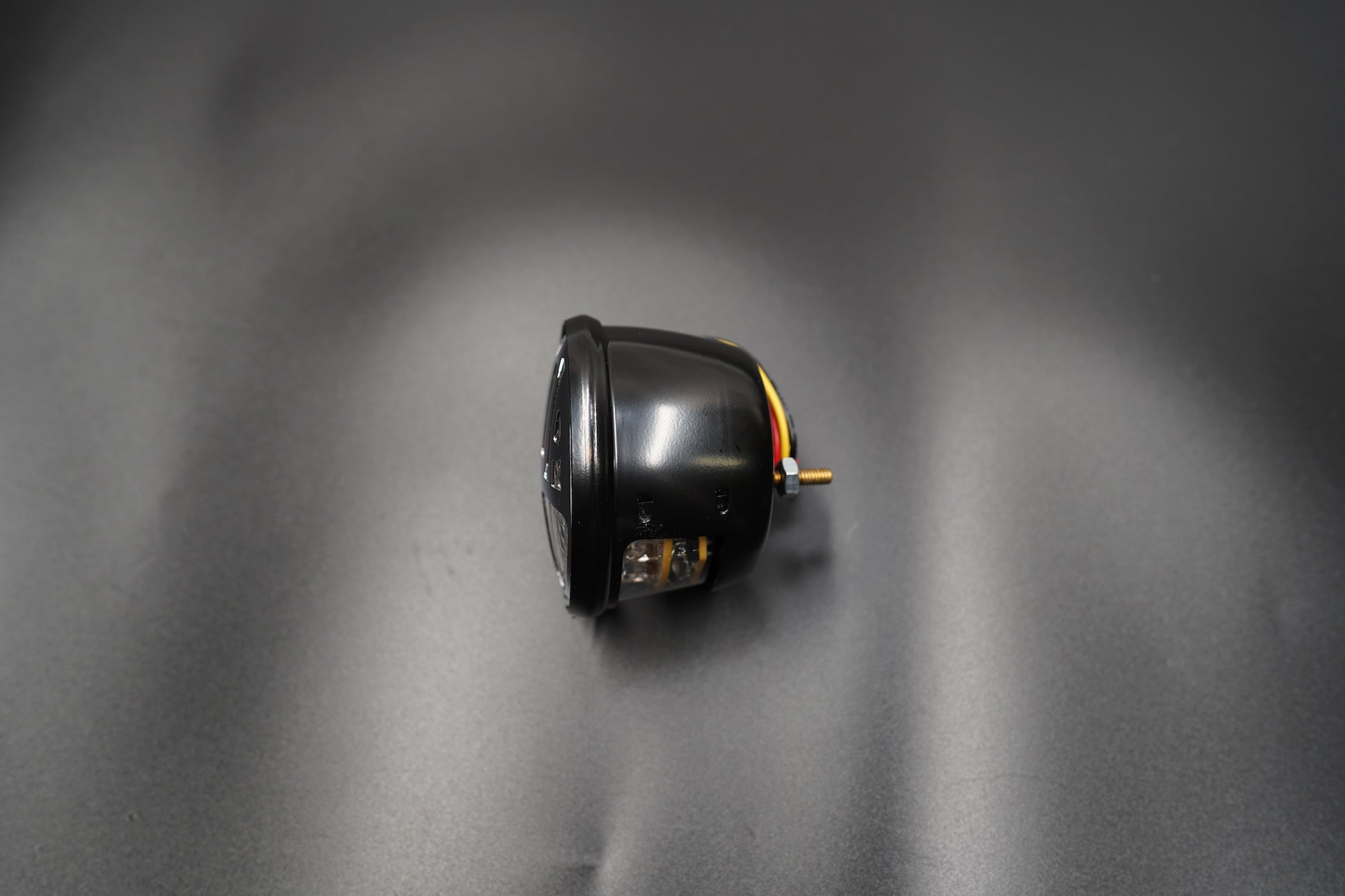 Depth shot showing solid metal housing thickness.