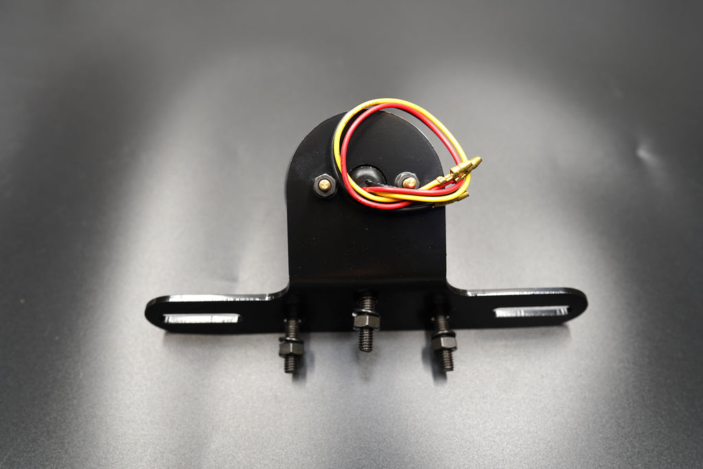 Left side view highlighting metal housing and compact depth