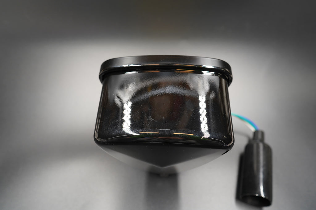 Bottom mount view showing universal bolt fitting and cable entry.