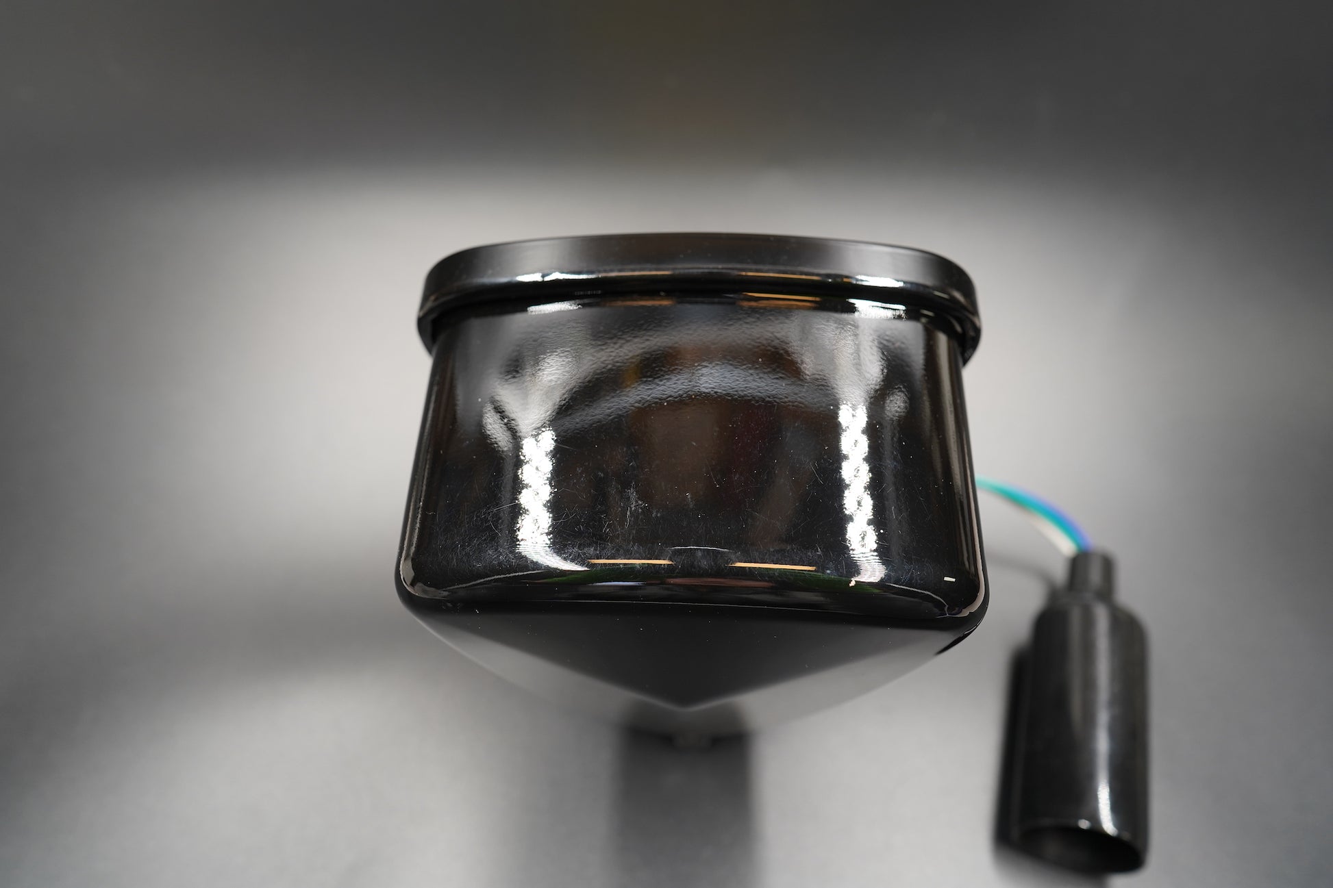 Bottom mount view showing universal bolt fitting and cable entry.