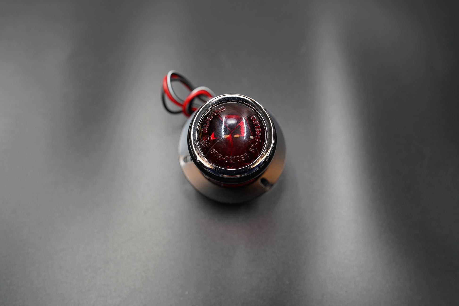 Angled rear shot showing body curvature and reflections.