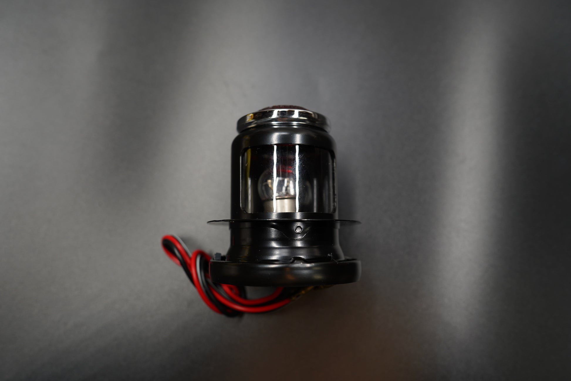 Flat lay showing full lamp form and wiring neatly arranged.