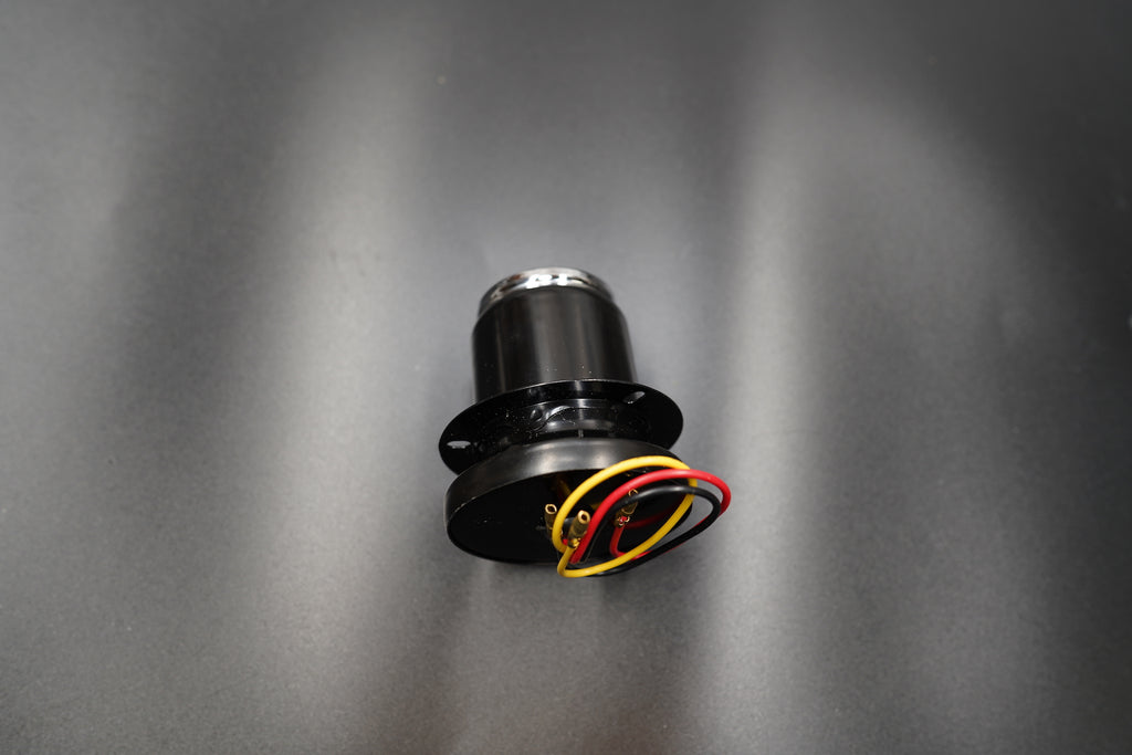 Detailed view of red glass lens showing texture and glow