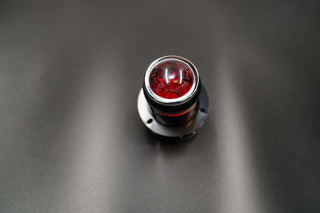 Bottom view of steel mounting surface and bolt holes.