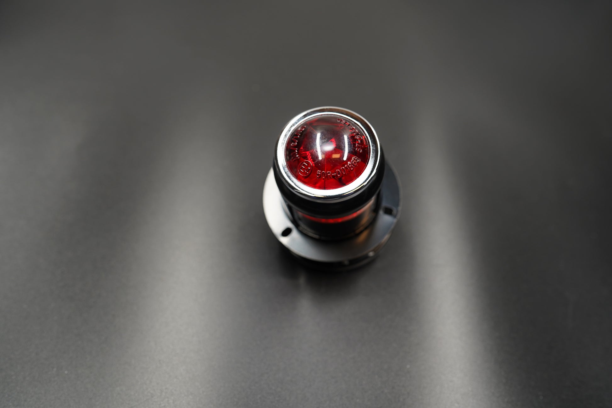 Bottom view of steel mounting surface and bolt holes.