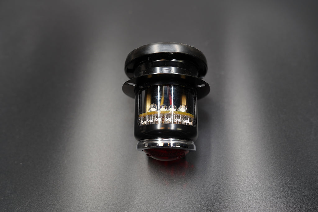 Top-down view highlighting black finish and mounting base.