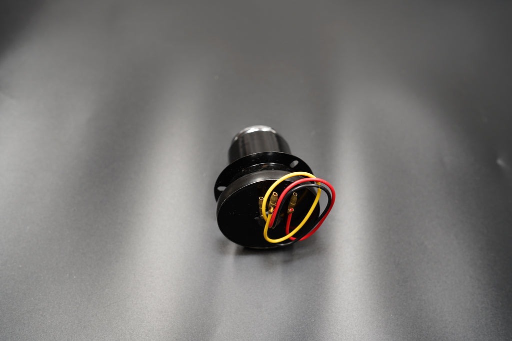 Close-up showing red and black wiring for tail, brake, and plate light functions.