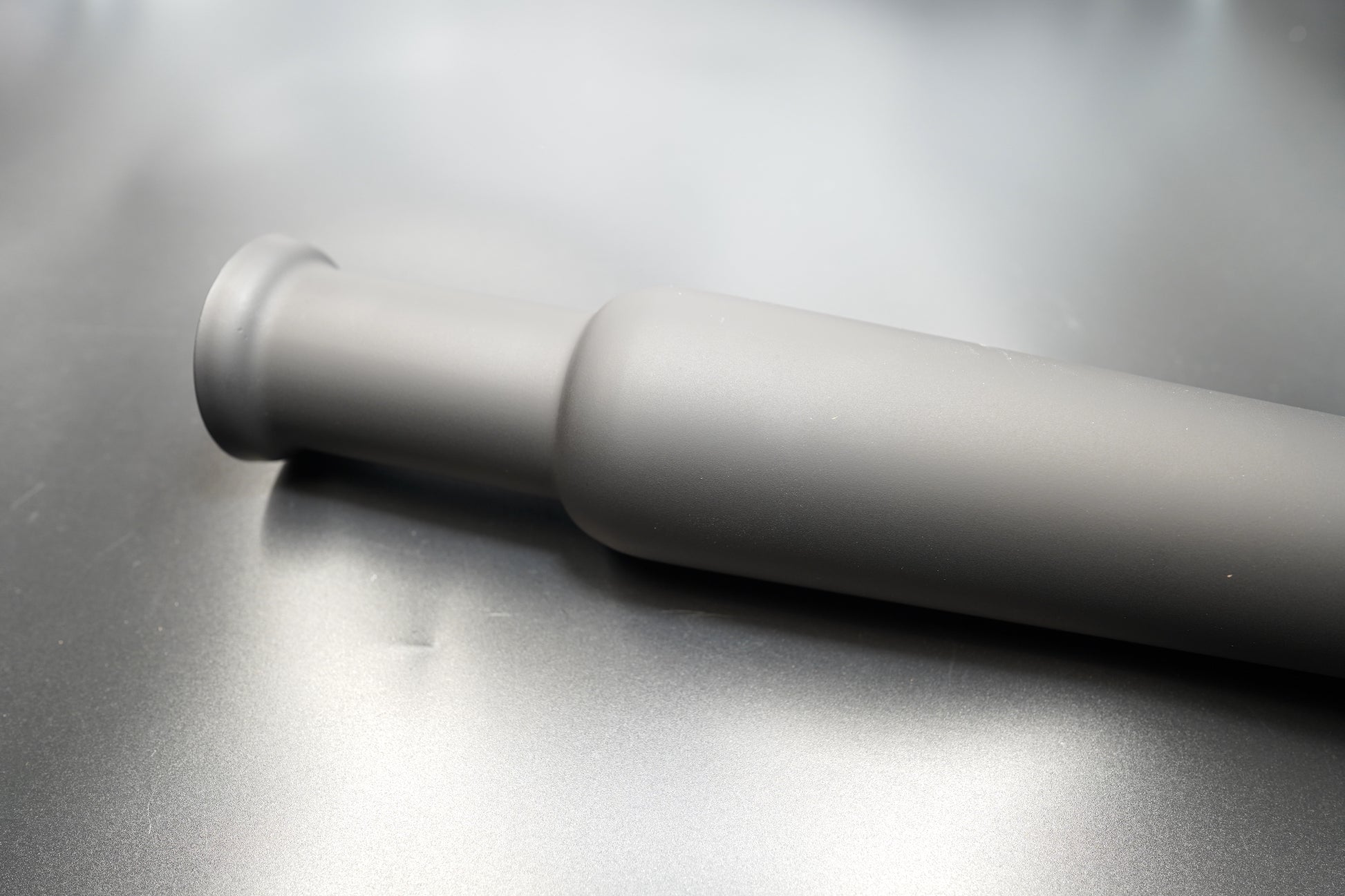 Rear outlet close-up showing internal baffle. 