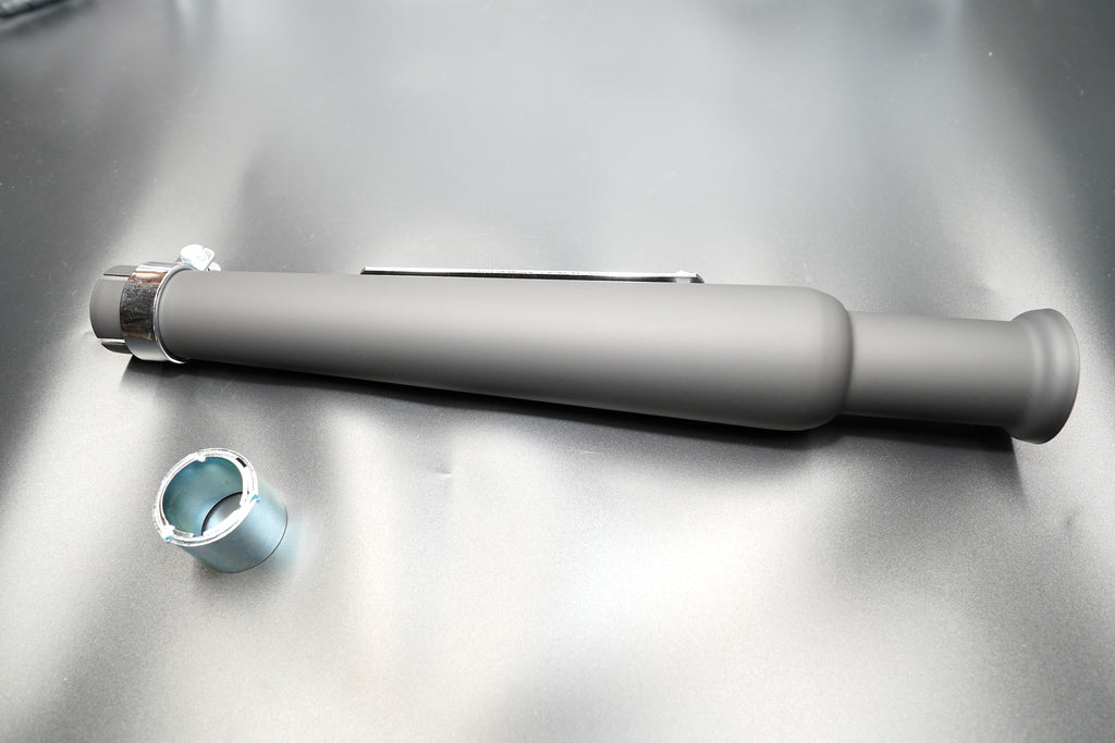 Matte black silencer full-length side view with included reducer sleeve