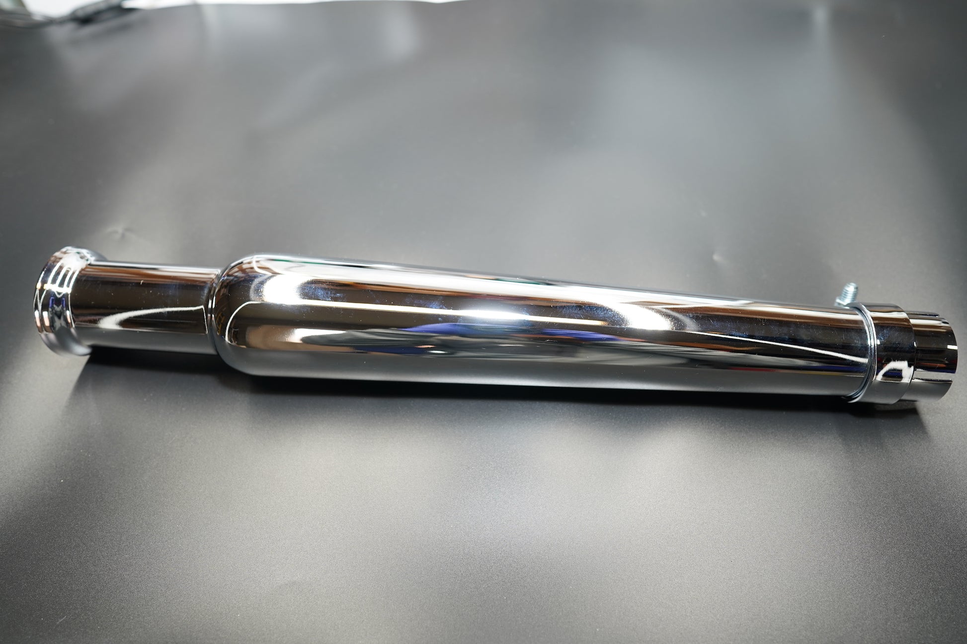 Chrome finish kit layout with reducer and clamp accessories.