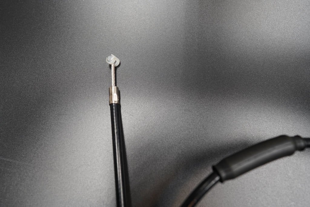 Close-up of Triumph Bobber clutch cable fitting and threaded section