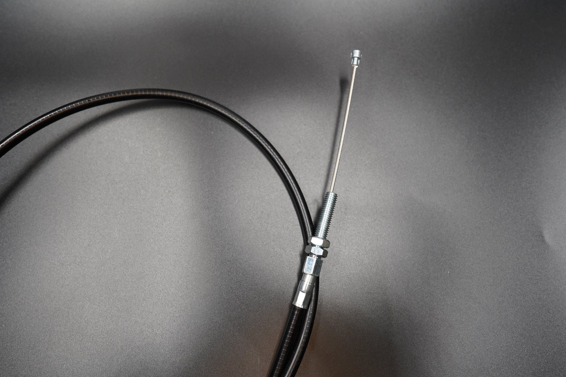 Detailed view showing Triumph Bobber extended clutch cable full length