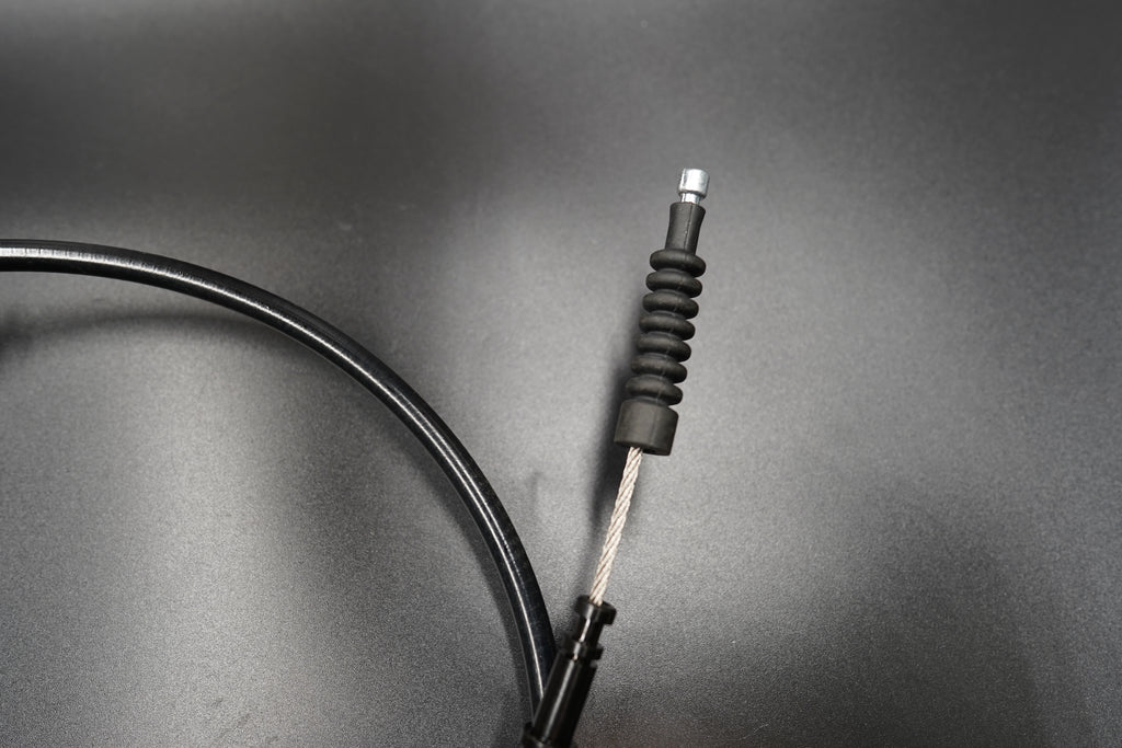 Detailed shot of Triumph Bobber clutch cable wire and joint