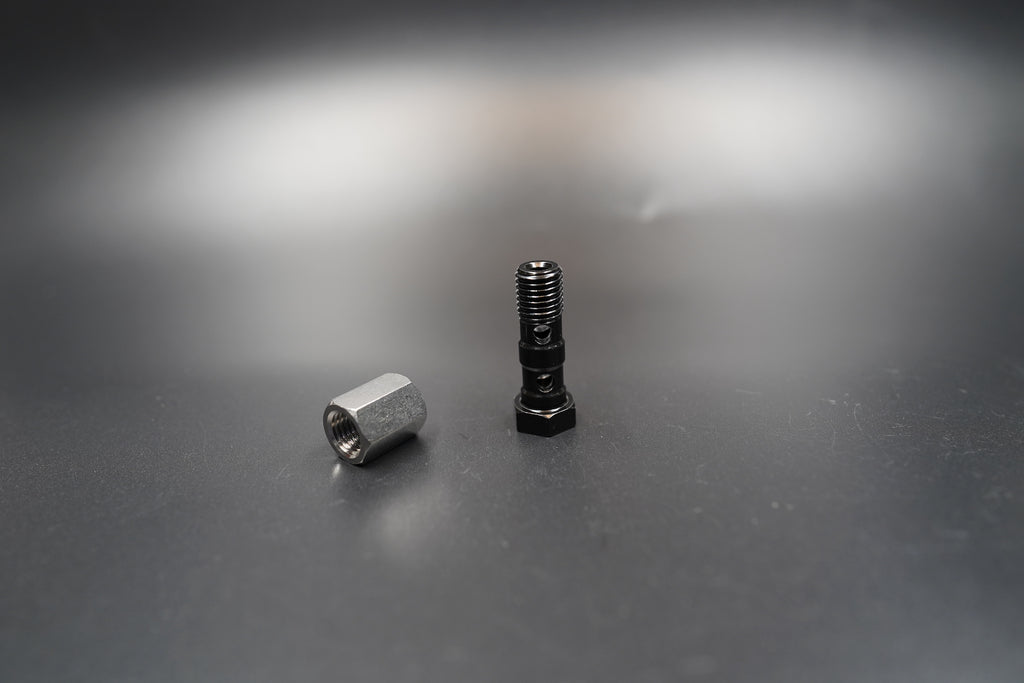  Close-up shot showing Triumph T120/T100 brake cable end fitting and washer assembly