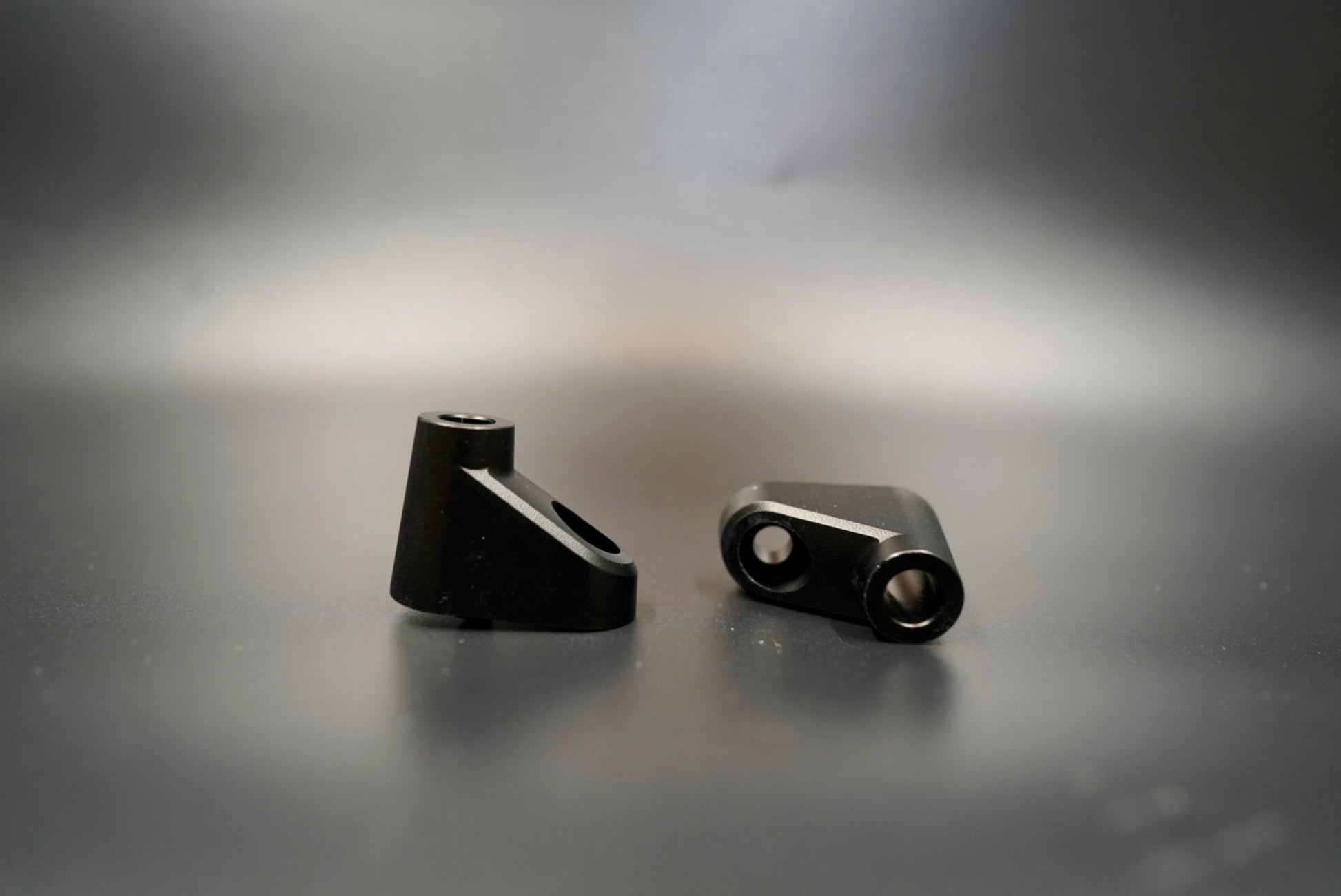 Side angle showing machined aluminum spacers and mounting hardware