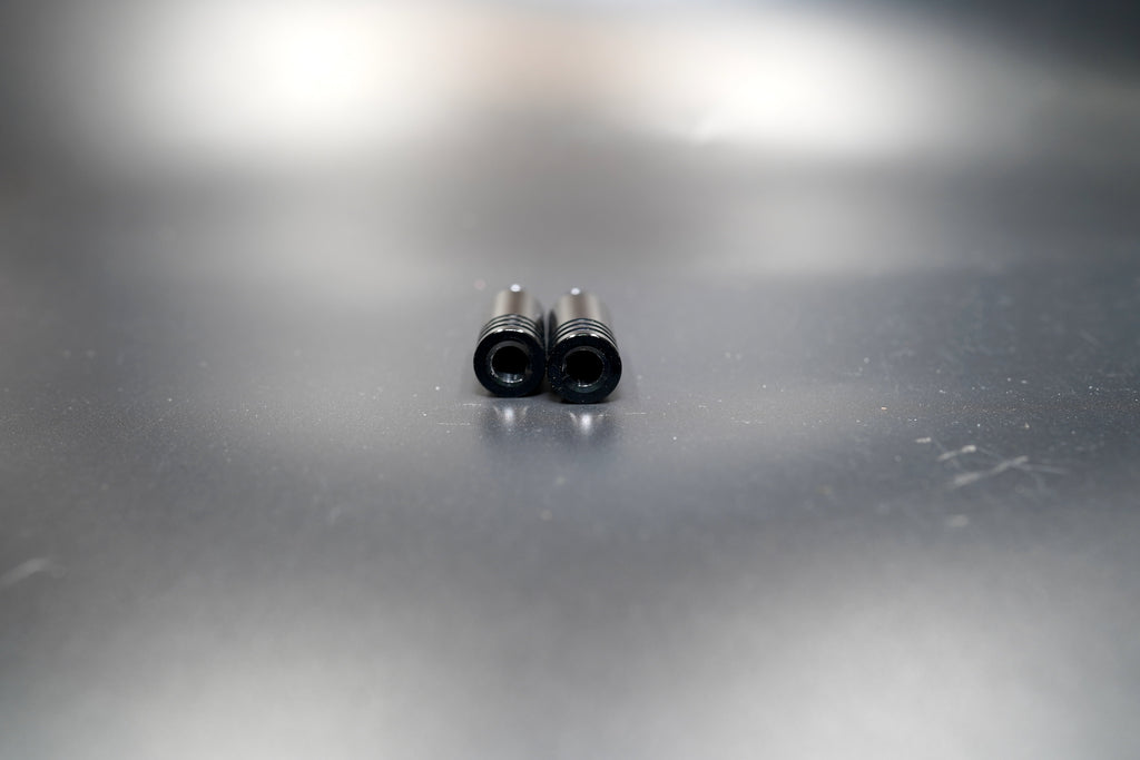 Close-up of 8mm thread detail on 3cm matte black turn signal extension rods