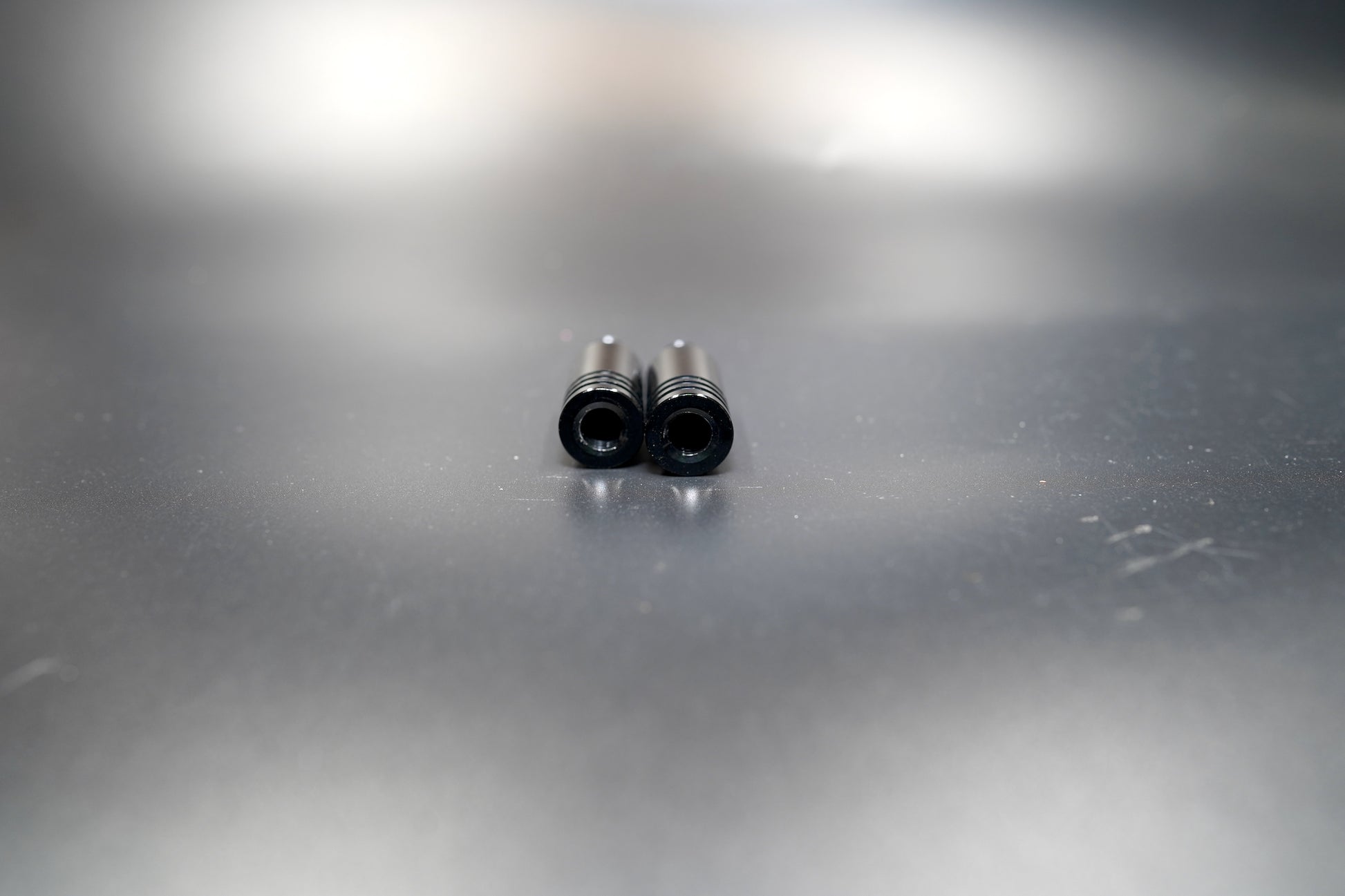 Close-up of 8mm thread detail on 3cm matte black turn signal extension rods