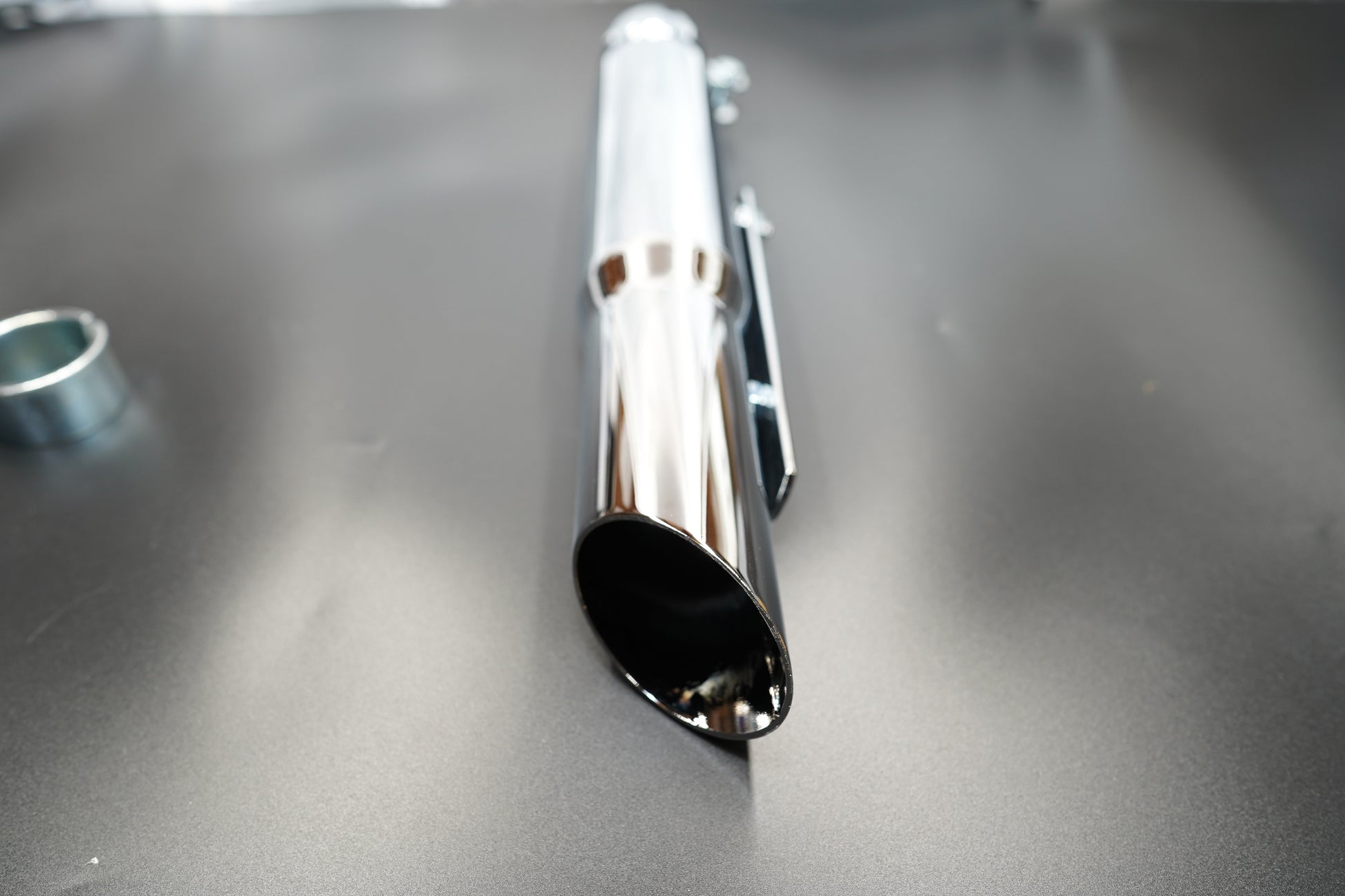 Front angle showing tapered opening and smooth polished chrome finish