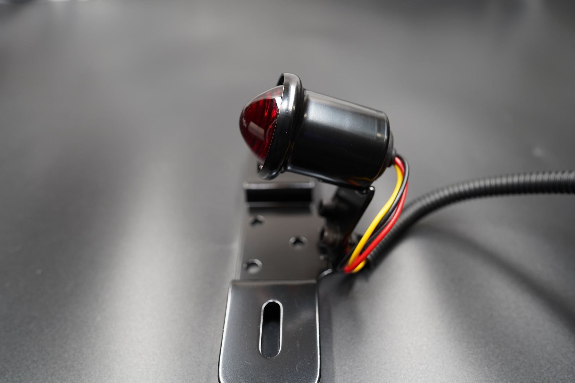 Angled top perspective showing matte black and chrome mixed finish.