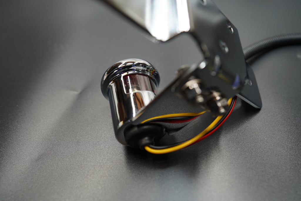 Bottom perspective emphasizing hinge plate design and screw points