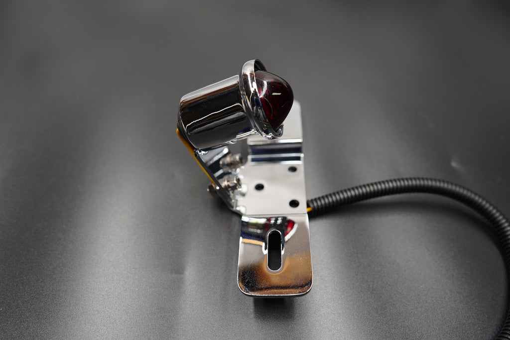 Flat lay view of the light and bracket on grey matte surface