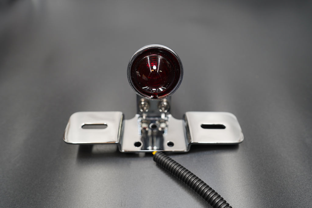 Wiring close-up with color-coded leads for 12V systems.