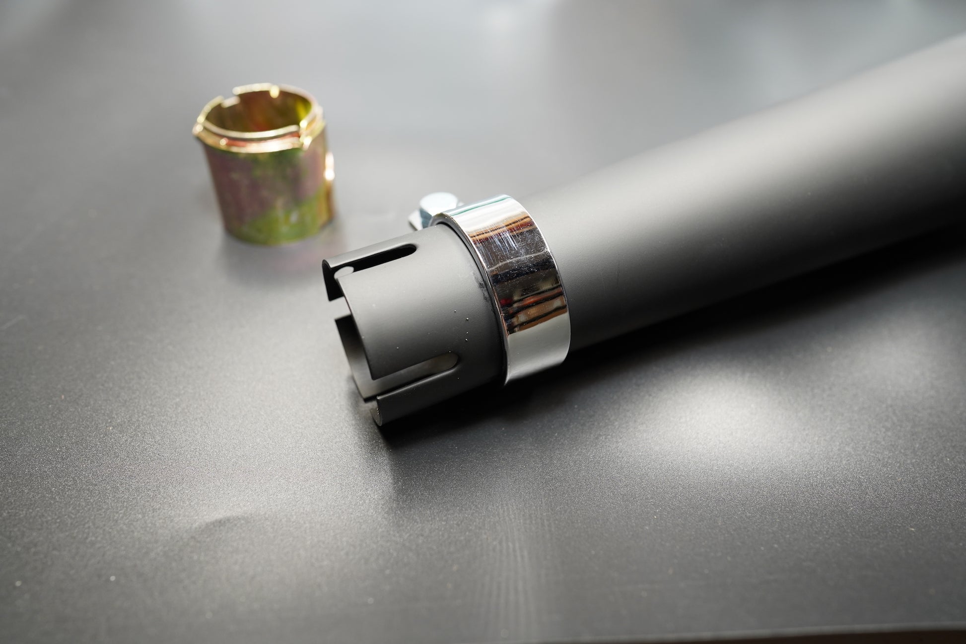  Internal baffle structure close-up showing exhaust outlet pattern.