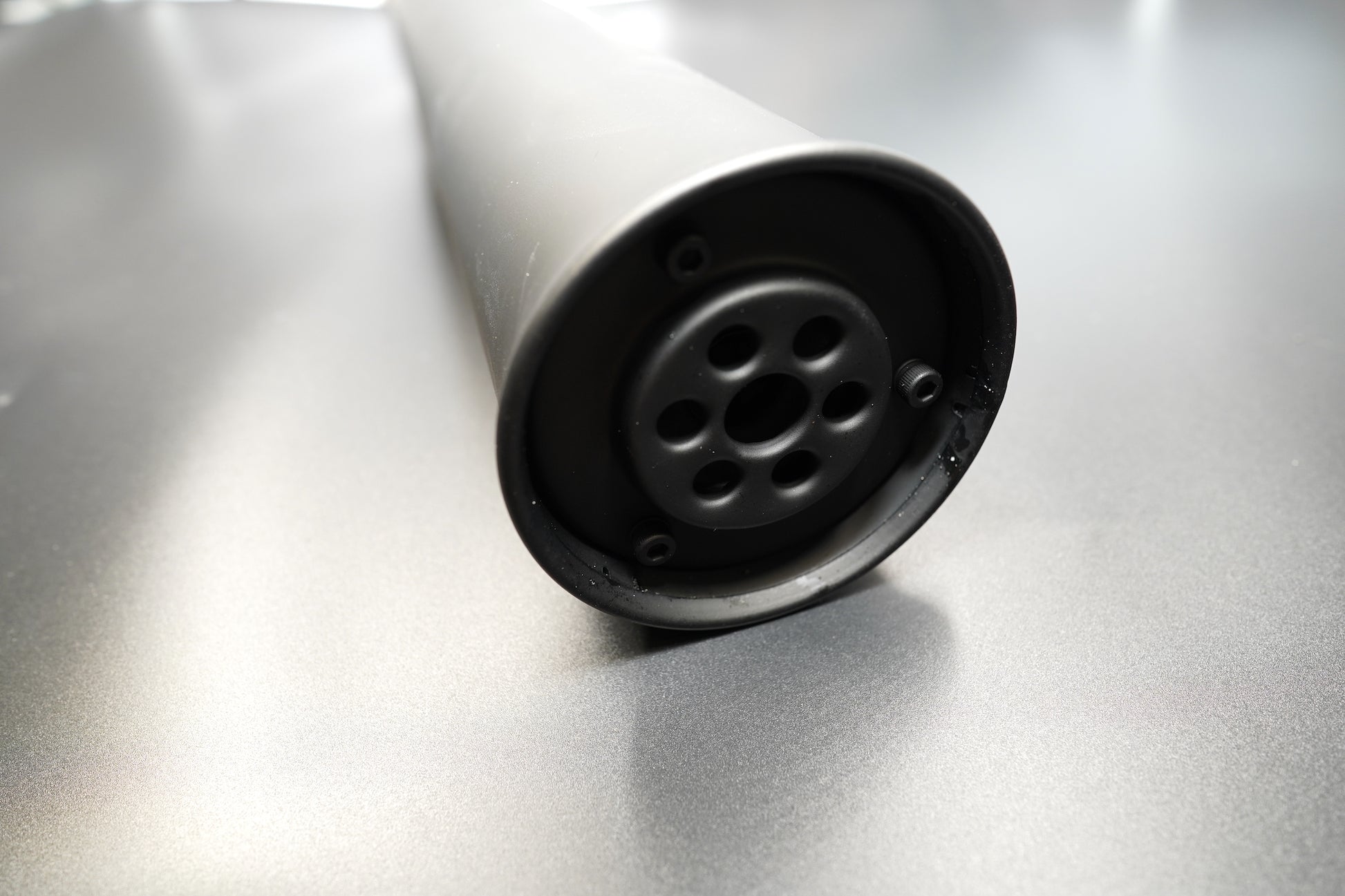 Black finish tapered silhouette viewed from rear.    