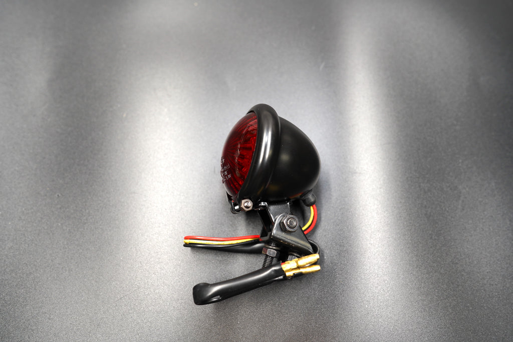 Angled view highlighting dual-function LED and compact metal alloy housing — built for endurance.