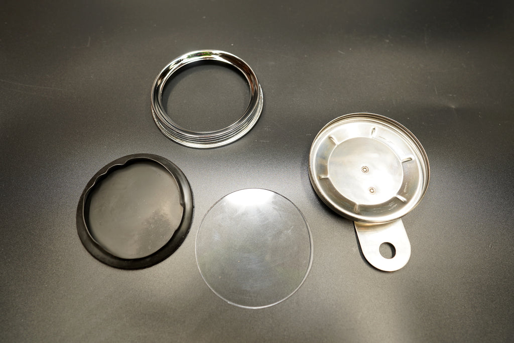 Comparison of matte black and brushed silver number plates side by side