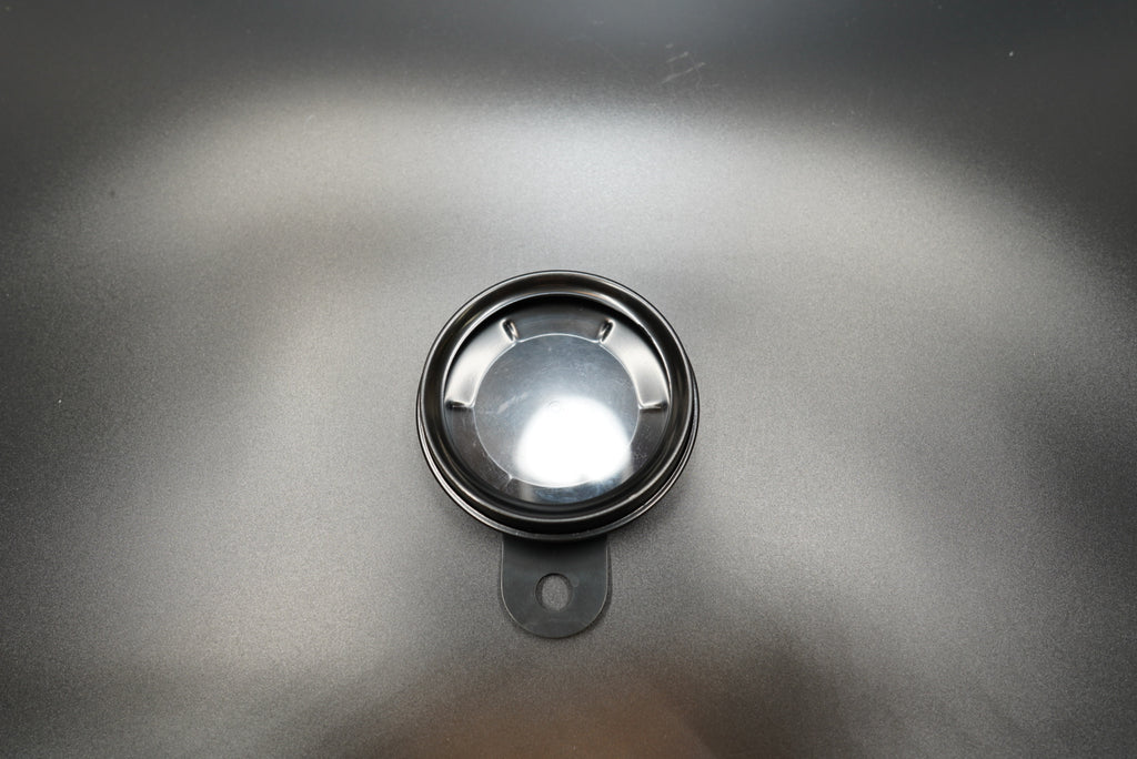 Top-down view showing circular design and matte finish option 