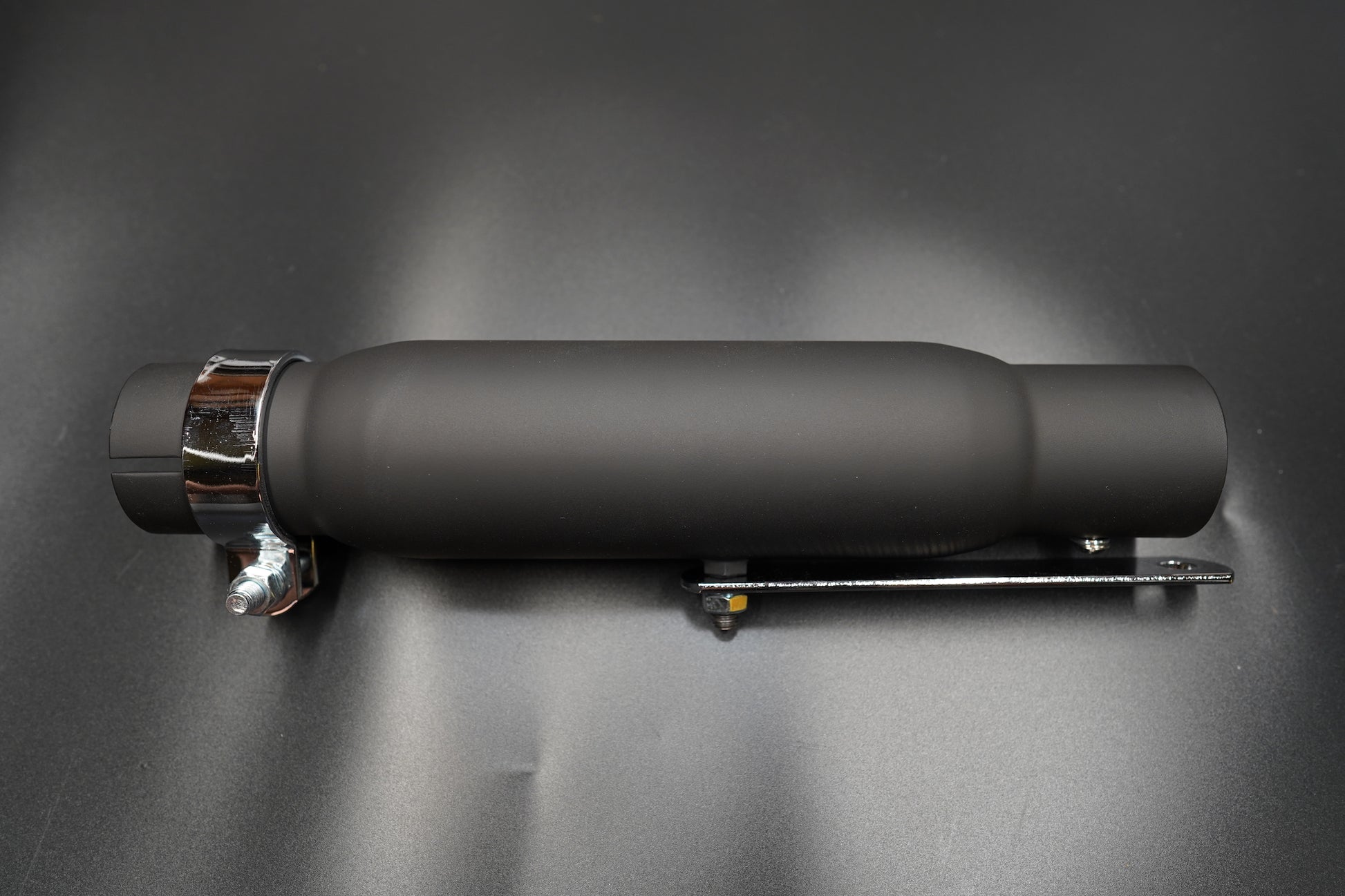 Angled view showing both matte black and chrome versions side by side.