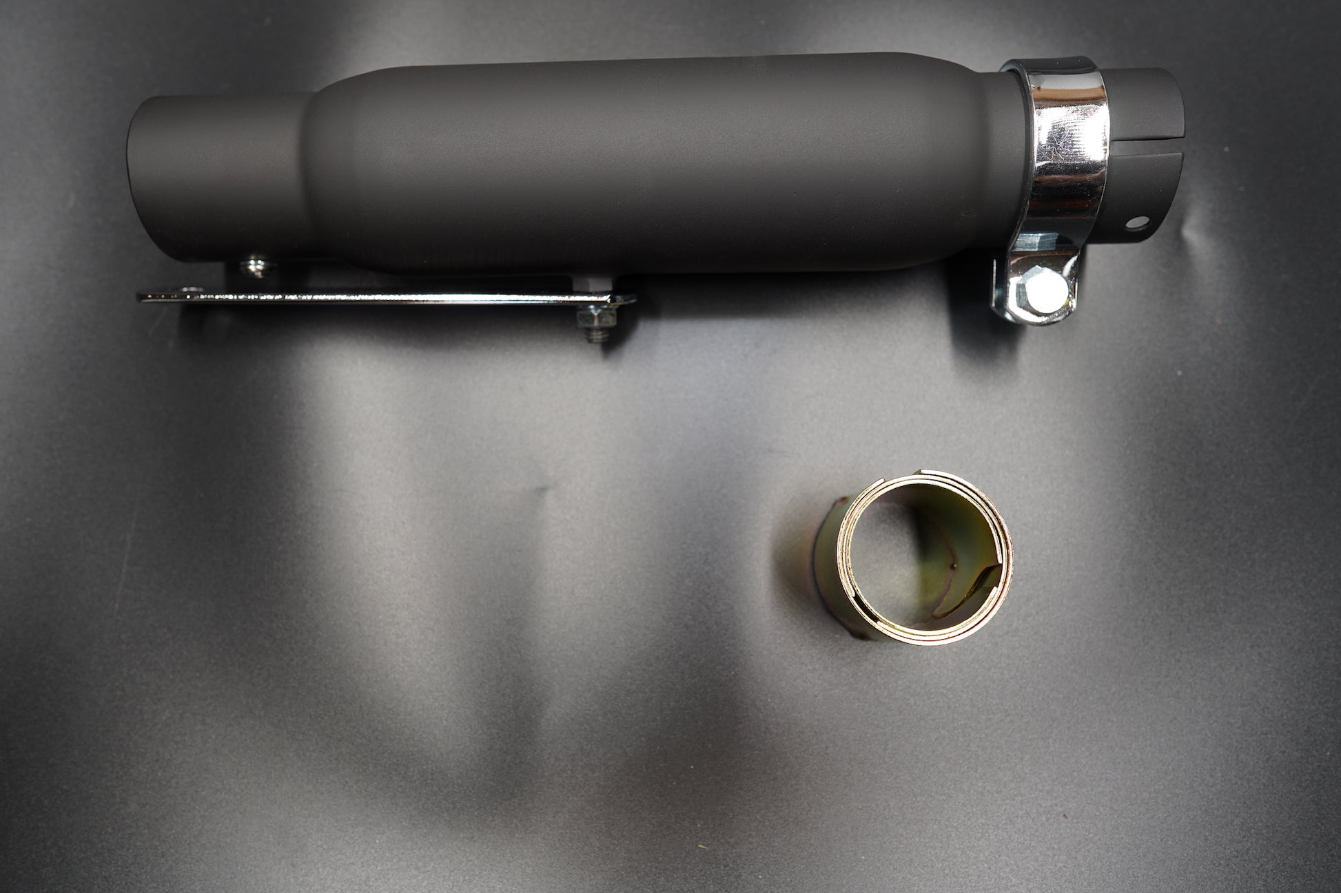 Chrome finish side view with polished surface and universal mount.