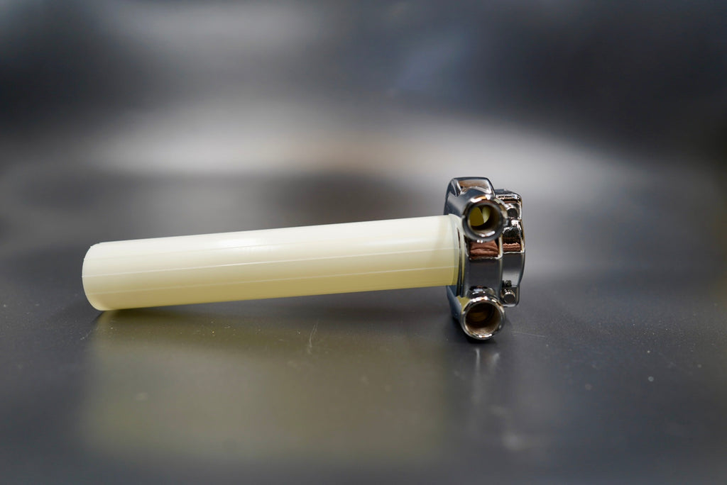 Vintage chrome throttle assembly front angle showing polished body and dual cable entry