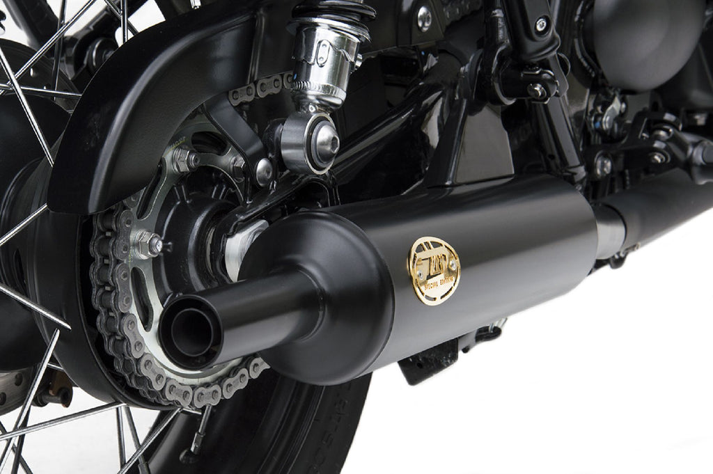 Close-up of Zard “Bottle” slip-on exhaust on Triumph Bonneville T120 — brushed stainless finish and precise fitment.